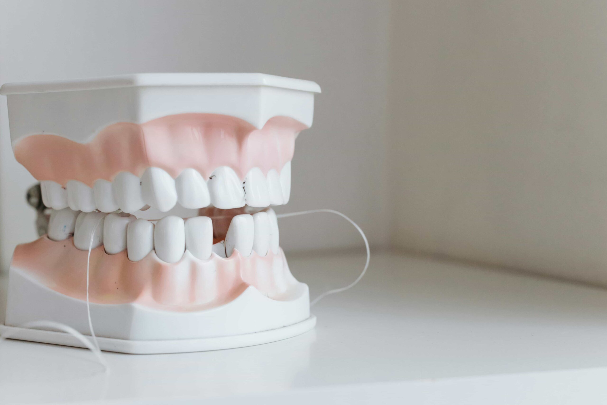 floss on teeth